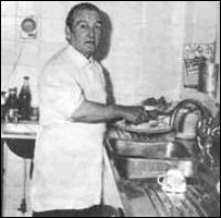 John Lennon's father, Freddie Lennon, working in a kitchen.