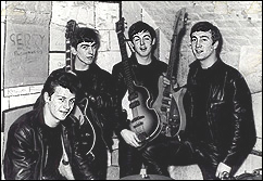 The Beatles pose for a photo backstage at The Cavern Club in Liverpool. Left to right: Pete Best, George Harrison, Paul McCartney, and John Lennon.