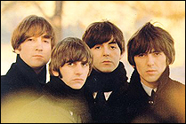 The Beatles pose during a photo session for their Beatles For Sale album in 1965.