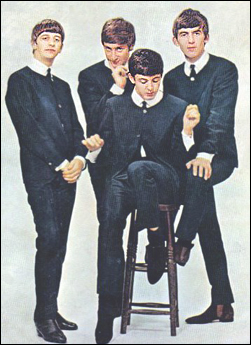 The Beatles in a playful mood during one of their early formal photo sessions. Left to right: Ringo Starr, John Lennon, Paul McCartney, and George Harrison.