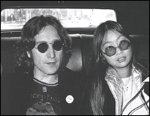 John Lennon and May Pang take a limo ride in 1974.