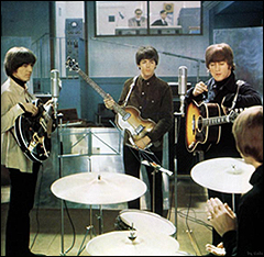 The Beatles film a recording session in a scene from their second feature film, Help!