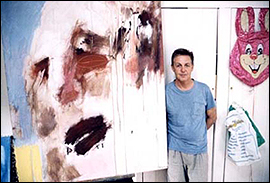 Paul McCartney poses with one of his paintings, which he put on display in 1999.