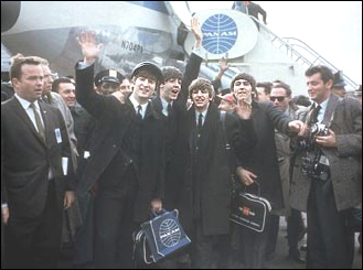 The Beatles arrive in America on February 7, 1964. Left to right: John Lennon, Paul McCartney, Ringo Starr and George Harrison.