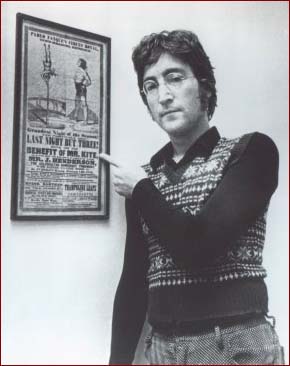 John Lennon shows the vintage circus poster that inspired his colorful song Being for the Benefit of Mr. Kite on the Sgt. Pepper album.