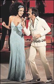 Sonny and Cher perform on their popular American TV show in the 1970s.