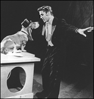 Elvis Presley sings his big hit Hound Dog to the real thing on The Milton Berle Show in the late 1950s.