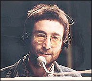 John Lennon during his performance of Instant Karma! on British TV.