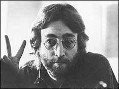 John Lennon gives the Peace Sign in a photo taken in the early 1970s.
