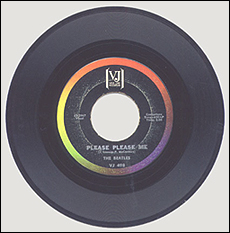 The Beatles single, Please Please Me on VJ Records. This is the version that American fans had in early 1964.