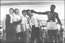 The Beatles with Cassius Clay (now Mohammad Ali) in Florida during their first US visit.