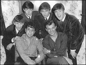The Beatles pose with Chris Montez (bottom left) and Tommy Roe (bottom right) during their British tour with the two American performers. The Beatles left to right: Ringo Starr, Paul McCartney, George Harrison and John Lennon.