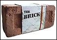 The brick? It seems possible that John Lennon could have been so angry at Paul McCartney that he would throw a brick through his window. But no one really knows if this juicy bit of Beatle lore happened or not..