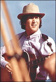 John Lennon behind the scenes of the Beatles second movie, Help!, while on location in the Bahamas.