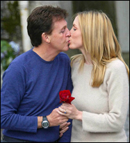 Paul McCartney kisses his second wife, Heather Mills.
