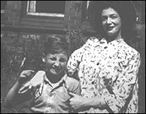 A young John Lennon with his mother, Julia Stanley. He would go on to immortalize her in song on the Beatles White Album.