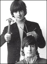 George Harrison and John Lennon joke around during a photo session in 1965.