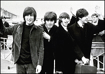 The Beatles at Heathrow Airport in London, catching their flight to Bahamas to film scenes from their second feature film, Help!