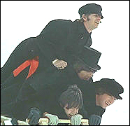 The Beatles ride a toboggan in the Swiss Alps in a scene from their move, Help!