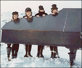 The Beatles in a fun scene from their second feature film, Helps! This was shot on location in the Alps.