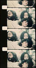 A few frames from a John and Yoko's Bed-In For Peace from 1969. Yoko his holding her daughter, Kyoko, in her arms.