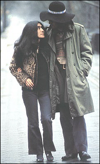 John Lennon and Yoko Ono walk on the streets of New York City.